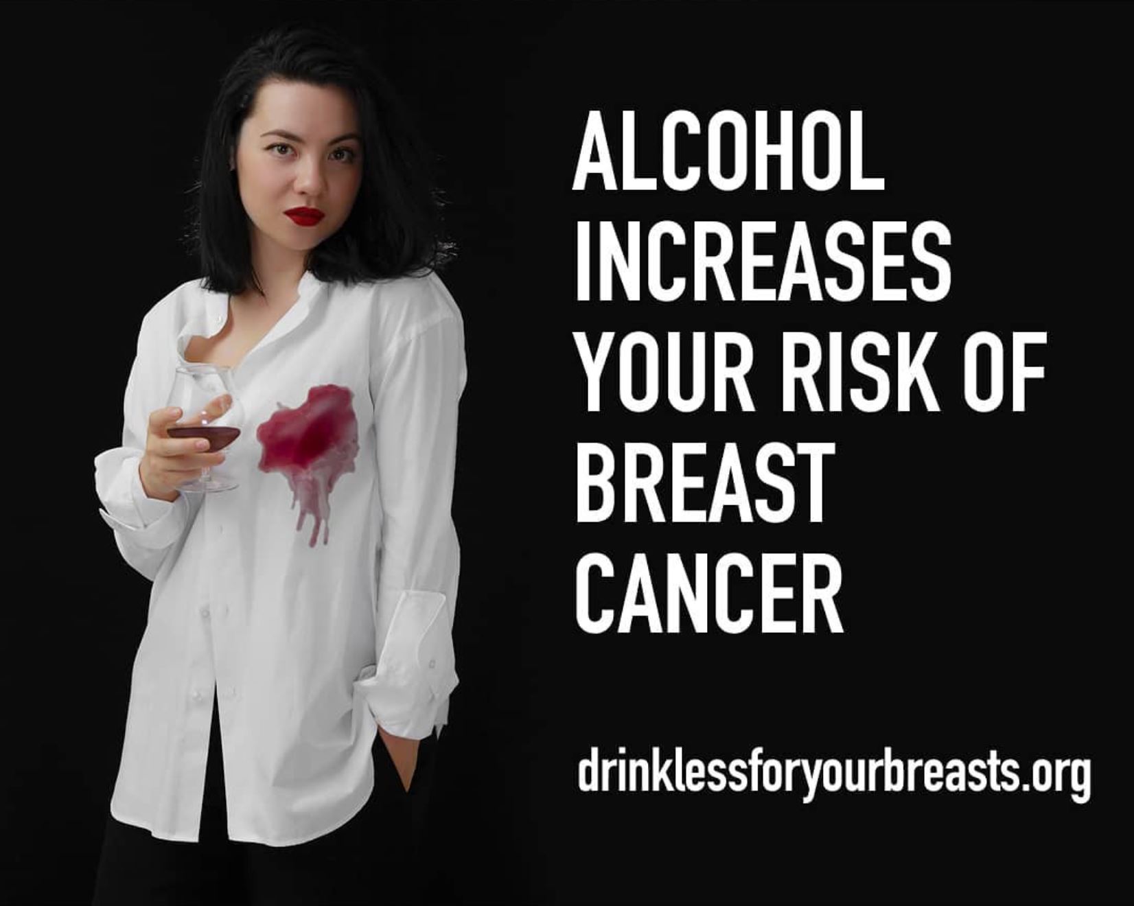 Young woman with a red wine stain on her blouse to symbolize a mastectomy